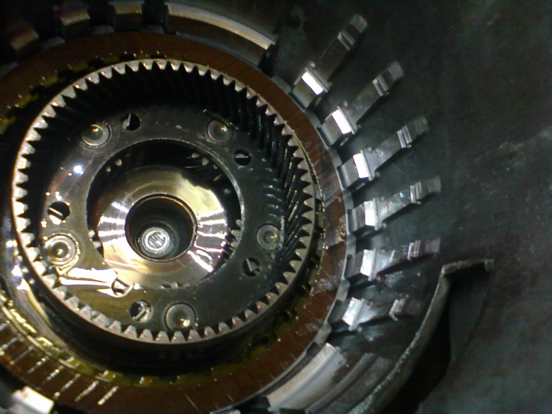 Steel, friction, steel, friction, steel, friction... The steels have teeth on the outside that lock against the inside of the case. The frictions have inner teeth that will engage the front planetary.